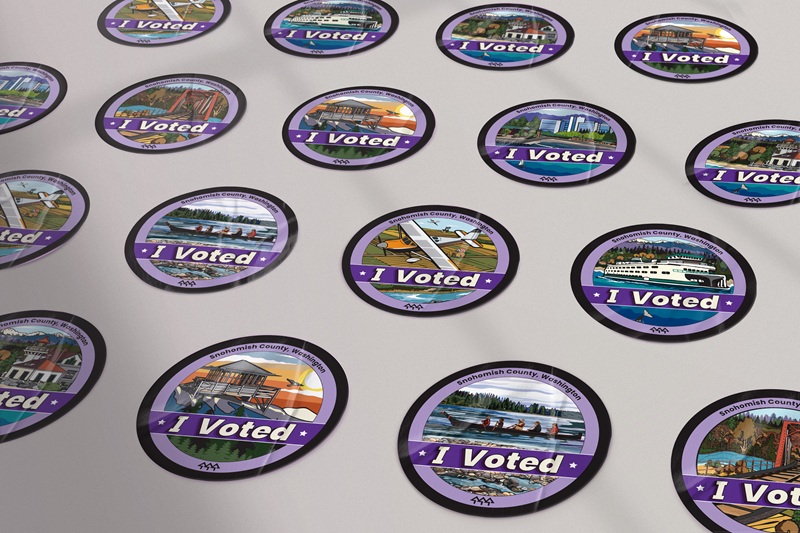 Rows of award-winning "I Voted" stickers featuring various iconic Snohomish County locations.