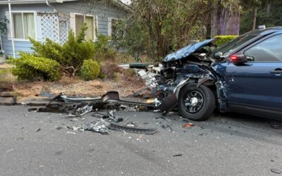 damaged Everett police patrol vehicles cruisers