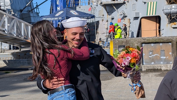 USS Gridley first hug sailor Isaiah smile